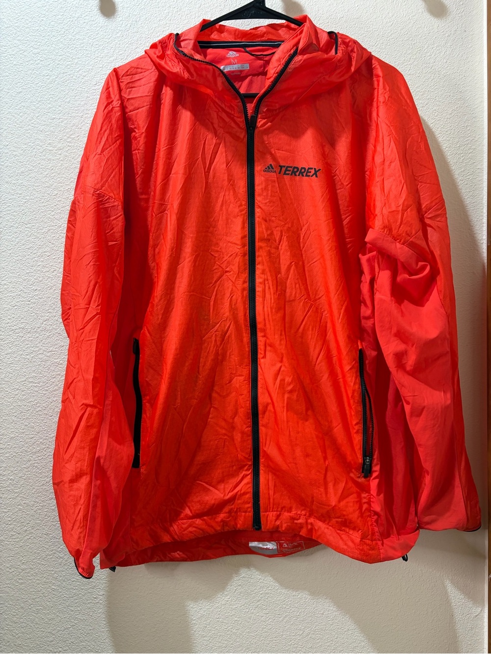 Adidas Terrex orange windbreaker jacket in size M